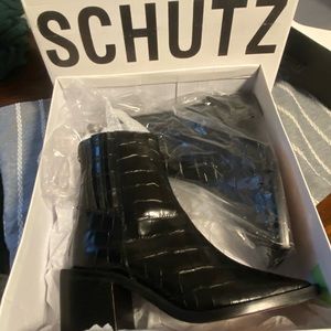 Black Booties NBW NWT.  Size 6.5 but fits like a 7